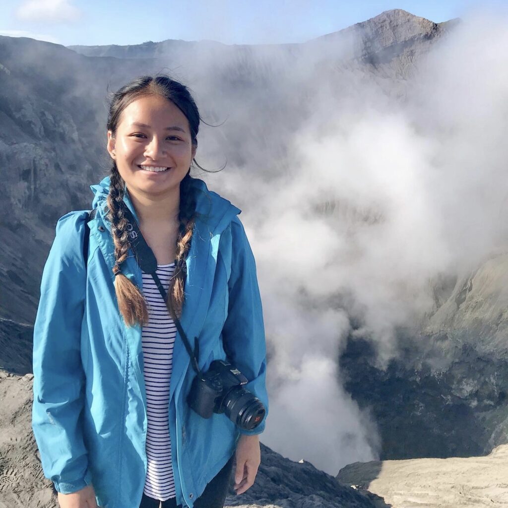 CAGIS staff member Christine Song on a mountain top