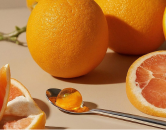 orange juice bubble on a spoon